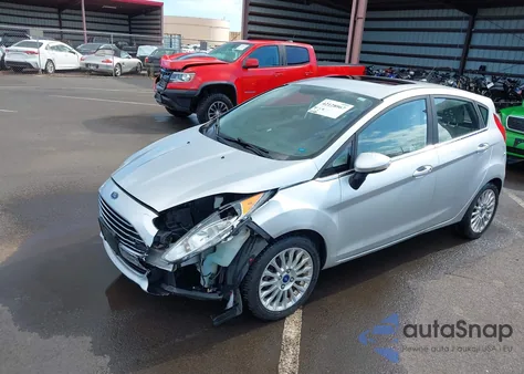 2015 Ford Fiesta Titanium z USA, uszkodzony, nr VIN 3FADP4FJ7FM133662